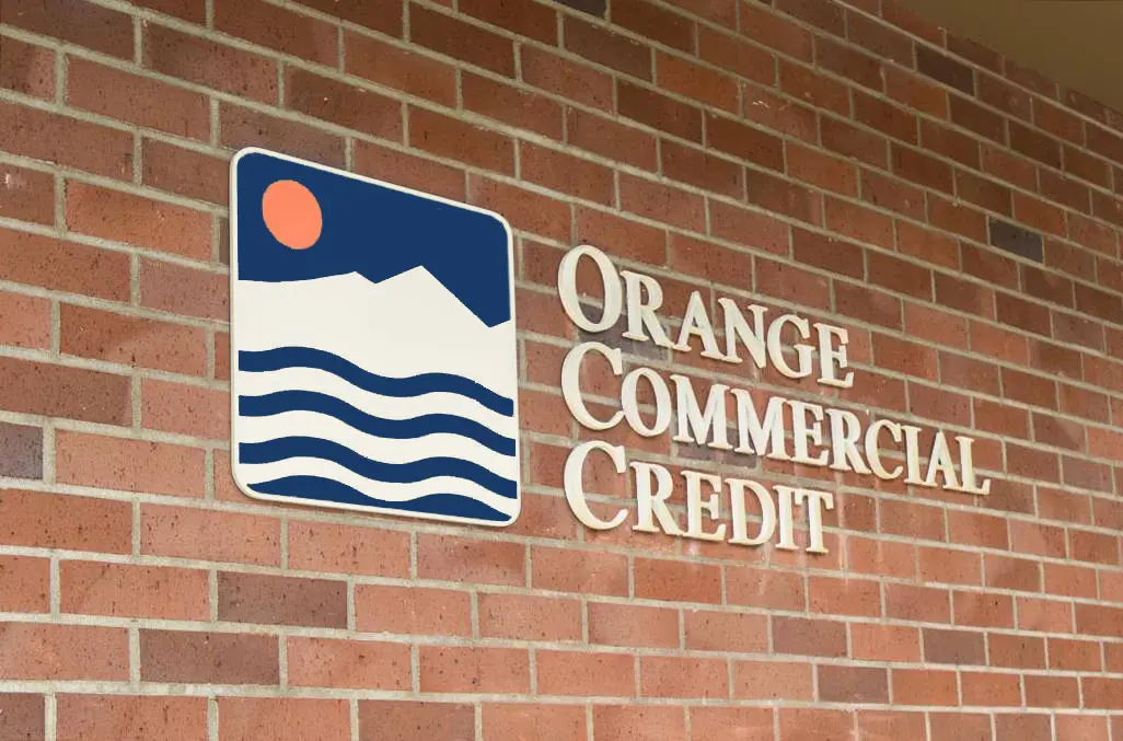 Orange Commercial Credit's fabulous team members gathered outside headquarters in Olympia Washington for a group photo.